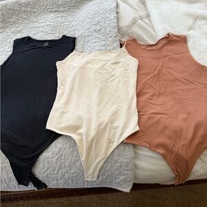 nuuds bodysuits, bundle of 3! Never worn. Size M